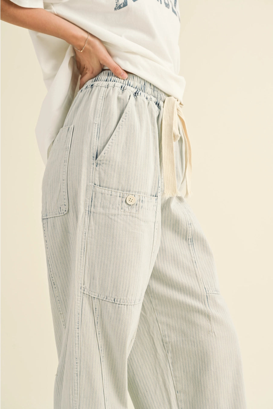 Blue and white striped barrel pants