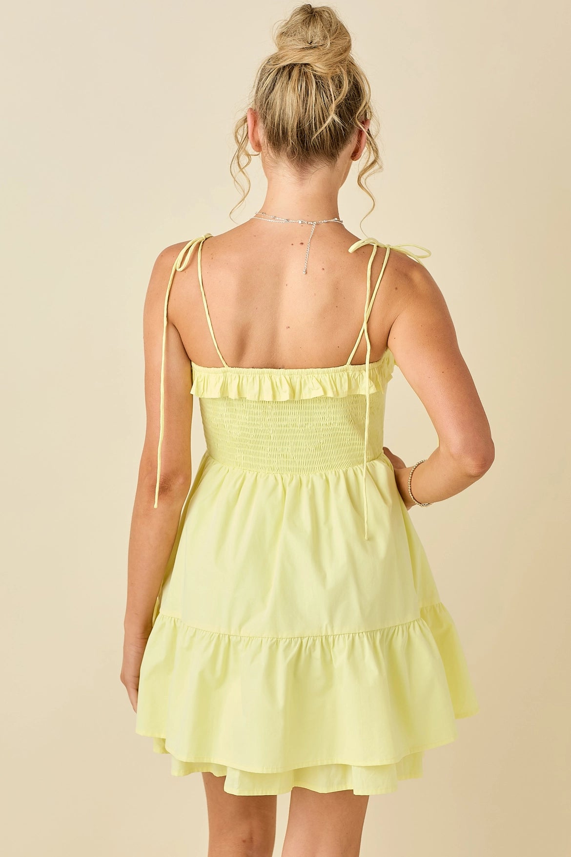 Ruffled neck yellow mini dress