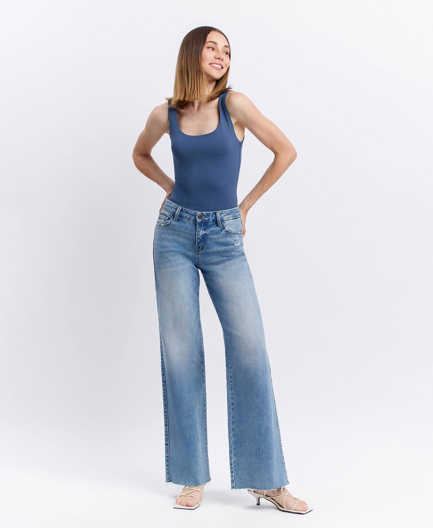 MID RISE CLEAN CUT RAW HEM WIDE JEANS