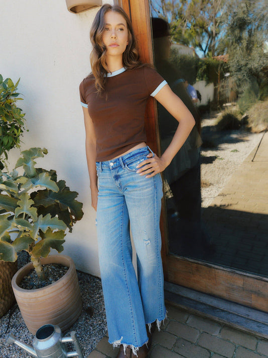 LOW RISE TINTED MEDIUM WASH WIDE FLARE JEANS