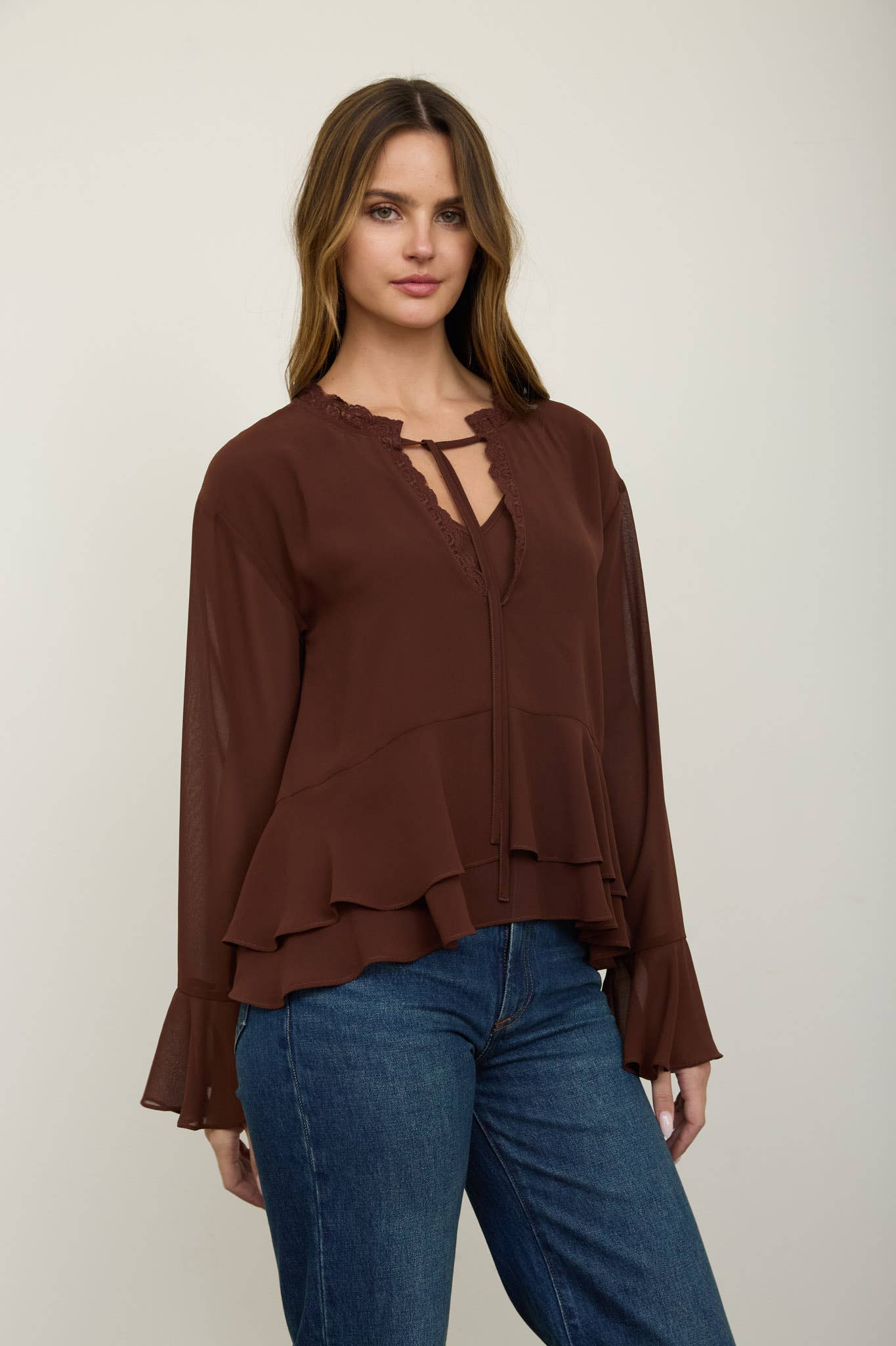 TIERED RUFFLE TIE-NECK LONG SLEEVE TOP