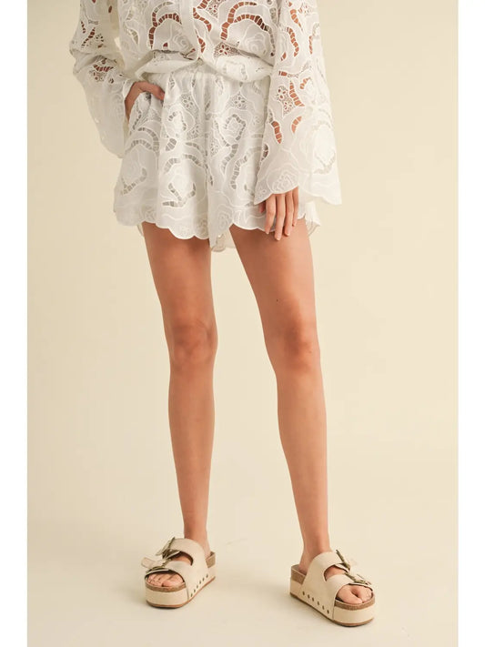 Floral eyelet patterned shorts